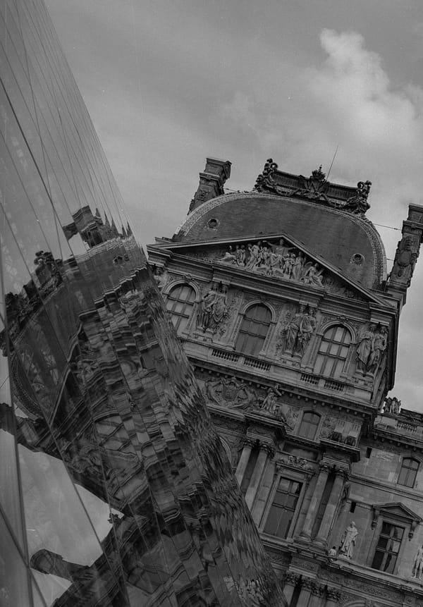 A Tourist in Paris with a Film Camera